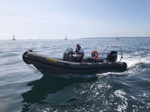 Boat for inspecting waterside properties